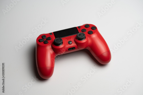 Console Player in red with black buttons