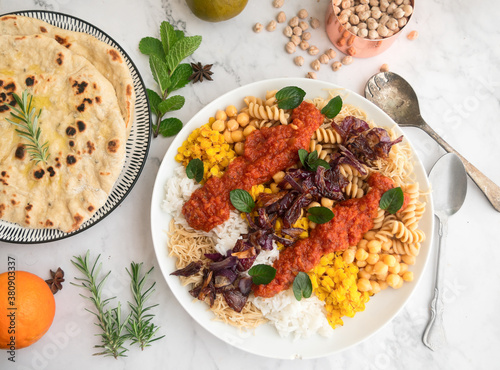 Kushari: plato combinado de legumbres y cereales egipcio photo