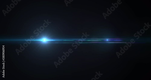 Blue moving glowing streaks, light lens flares on dark background