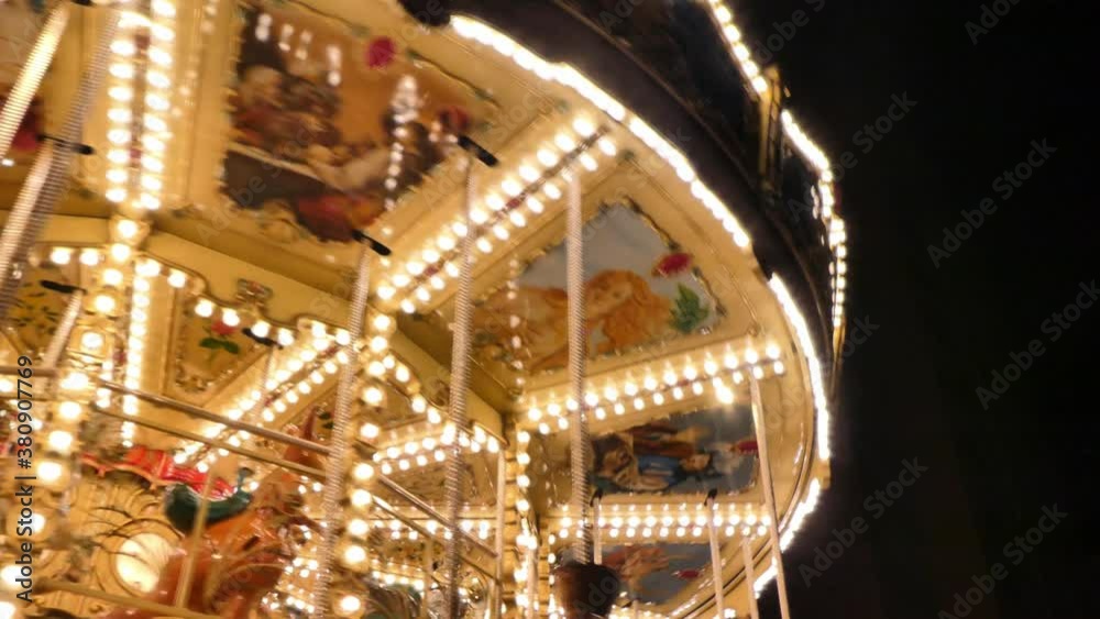 A beautiful detail of a carousel in the night