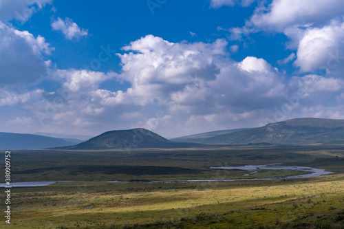 The Irkut River flows along a mountain plateau in the Eastern Sayan Mountains