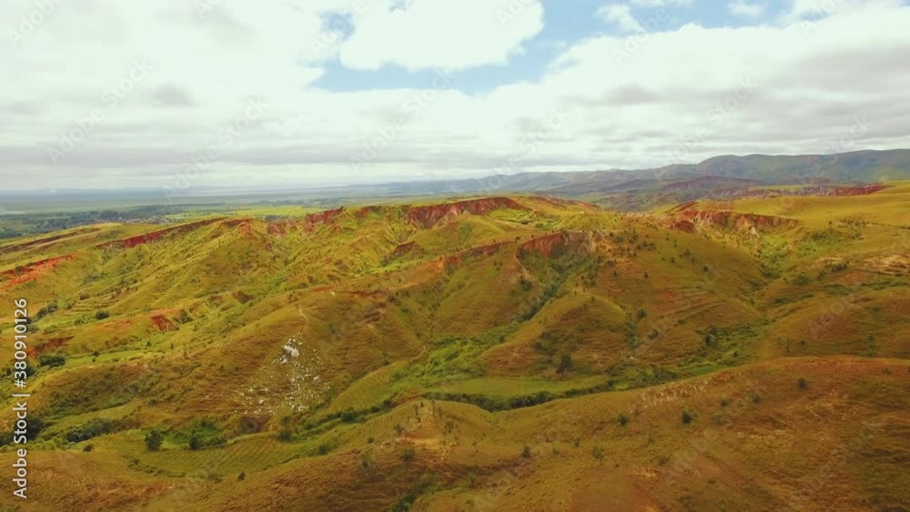 Aerial shot of a landscape in Madagascar with hills, fields and bushes. Aerial shot of a landscape in Madagascar with hills, fields and bushes.