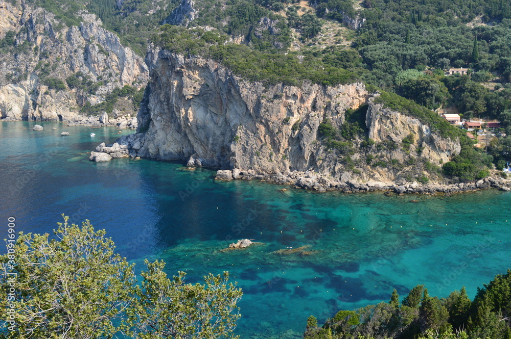 Naklejka premium The stunning turquoise waters in the Ionian Sea around Corfu, Greece