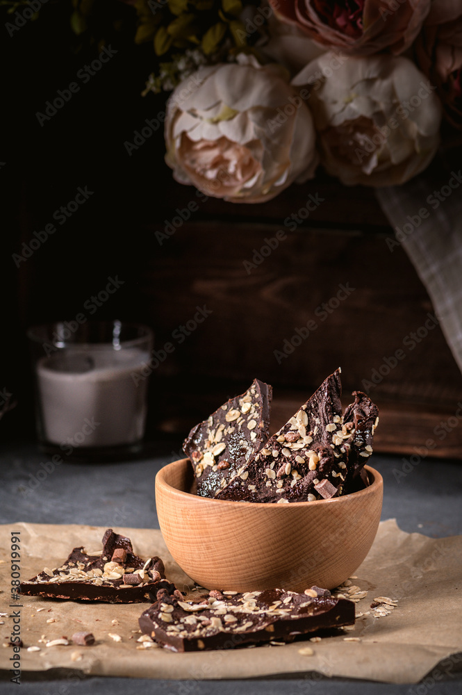 Homemade chocolate bar with granola and nuts Homemade chocolate bar with granola and nuts