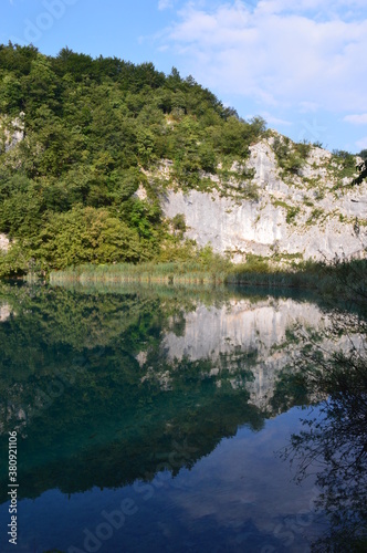 The pathways around the turquoise clear water in the Plitvice Lakes National Park in Croatia © ChrisOvergaard