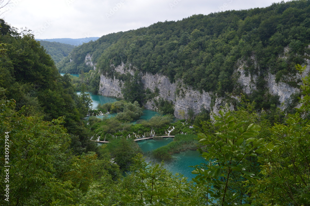The turquoise waters from the stunning waterfalls in the Plitvice Lakes National Park in Croatia