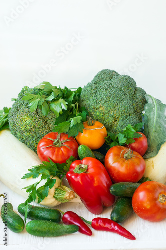 Different fresh vegetables on the table, fresh vegetables as background