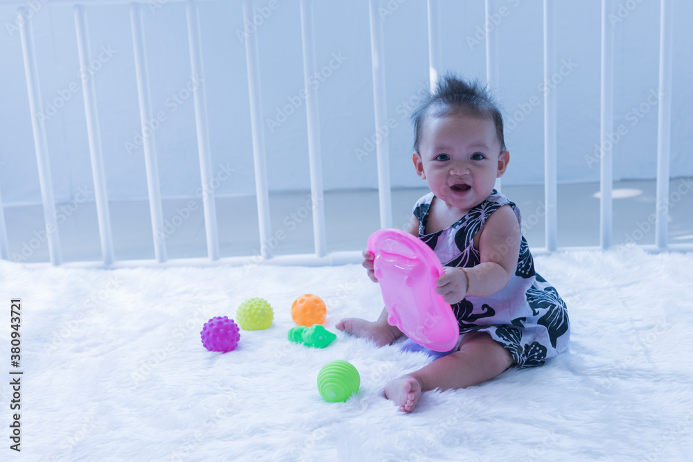 Children toddlers girls play toys at home, kindergarten or nursery. Children toddlers girls play toys at home, kindergarten or nursery.