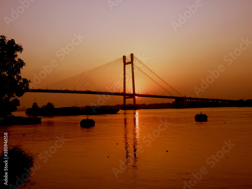 Kolkata Riverfront on the banks of Ganga or Hooghly River, photo taken around sunset time. © SAM