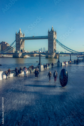 Sunny March day by the Thames around Tower Bridge.