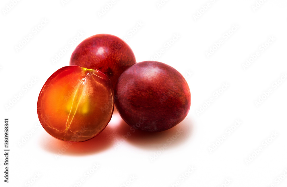 Red grapes in a cut on a white isolated background