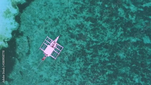 Boat in Kalanggaman Island in the Philippines photo