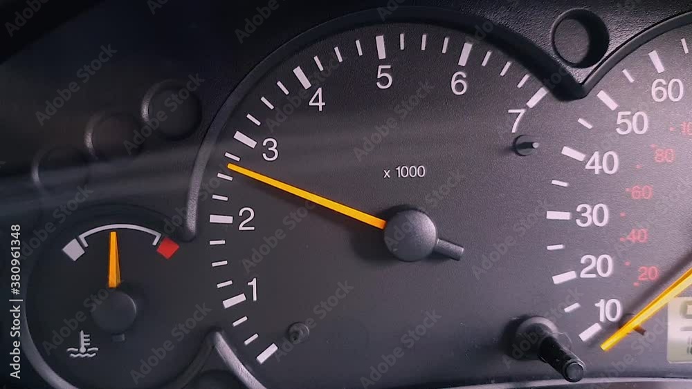 Car and vehicle rev counter with car reviving and needle moving. Stock