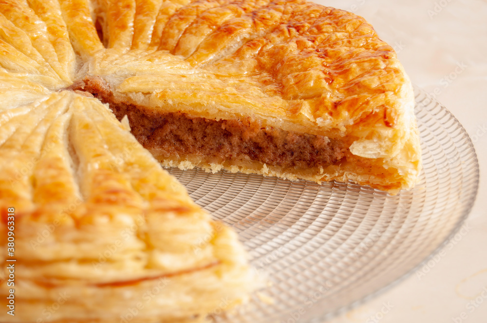 Pastry dough Galette des Rois with cream frangipane with white overground almond Pastry dough Galette des Rois with cream frangipane with white overground almond