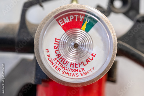 Close up of the dial on a home fire extinguisher