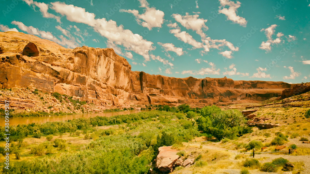 Fototapeta premium Aerial view of Colorado river and mountains near Moab, Utah