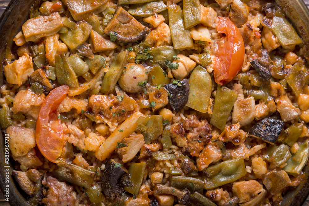 Close-up of paella with vegetables, natural ingredients, European cuisine Close-up of paella with vegetables, natural ingredients, European cuisine