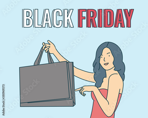 Black Friday banner concept. Beautiful girl carrying a shopping bag and smiling happily.