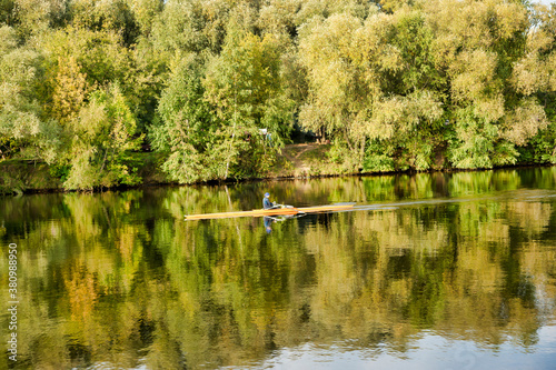 Obraz na płótnie Sportsman kayaking on the river. Autumn landscape. Moscow river in Strogino, Moscow w salonie