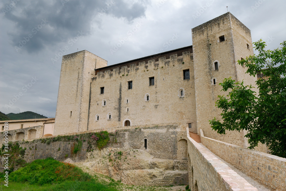 Walls and tower of medieval La Rocca Papal fortress in Spoleto Italy