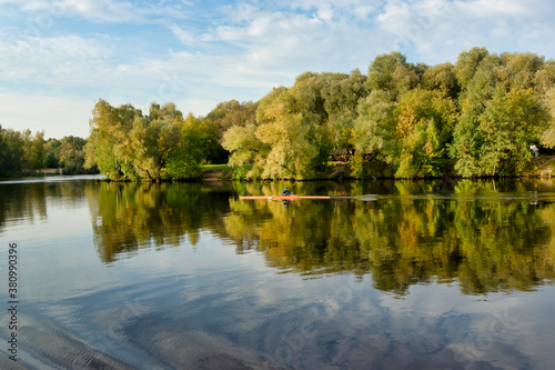 Obraz na płótnie Sportsman kayaking on the river. Autumn landscape. Moscow river in Strogino, Moscow w salonie