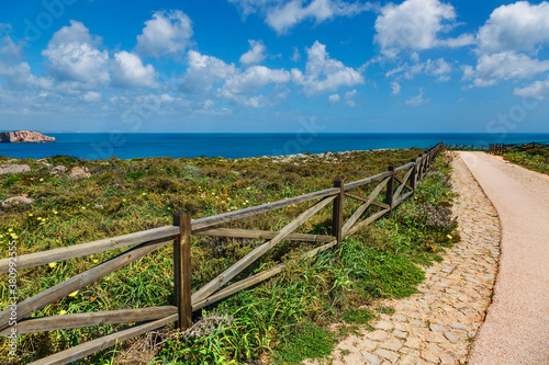 coast of Sagres with hiking trail and wooden balustrade, Algarve, Portugal, Europe