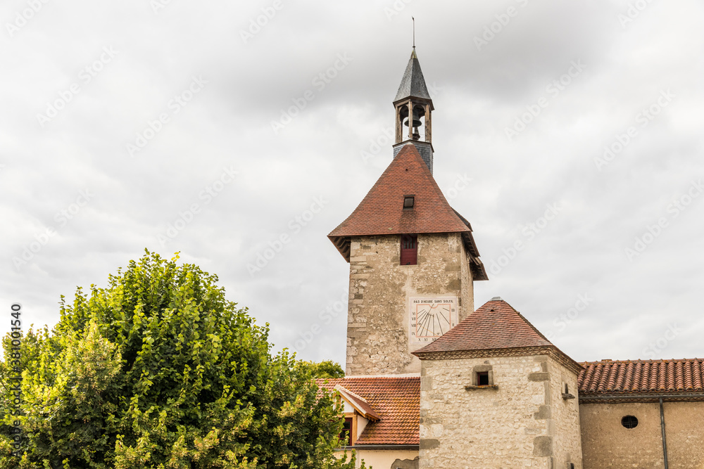 Obraz premium Charroux, France. Half-timbered house and church tower in one of the most beautiful villages in the Allier department in Auvergne