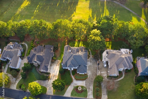 Aerial view of an upscale subdivision in suburbs of a city in USA