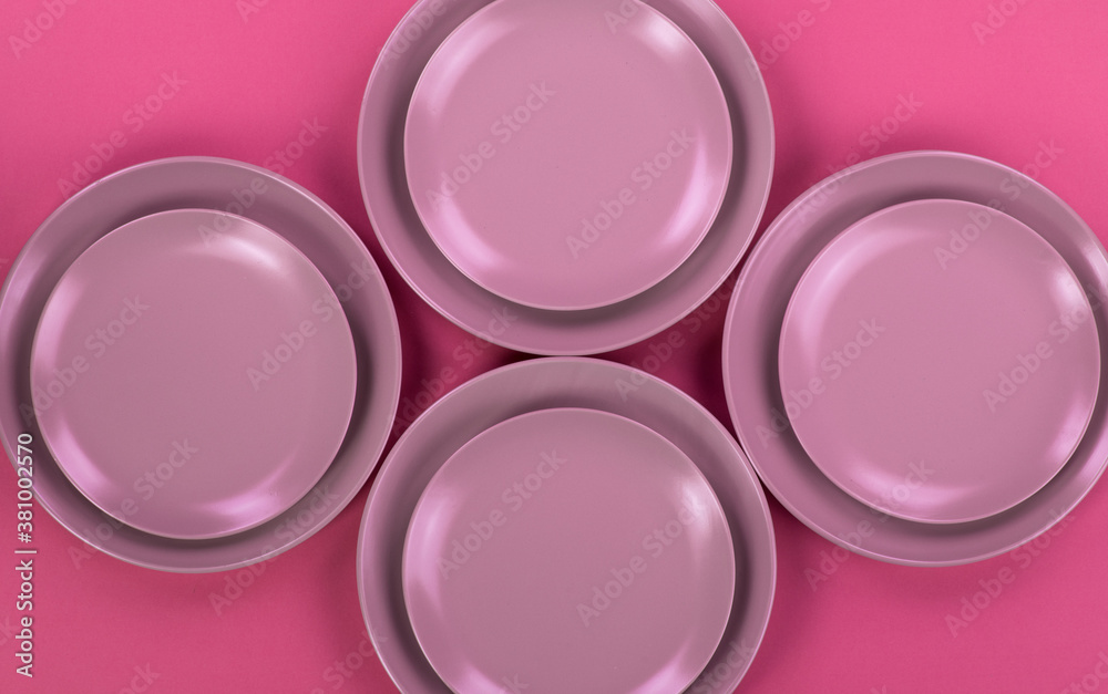 red kitchen ceramic plates isolated on red background red kitchen ceramic plates isolated on red background
