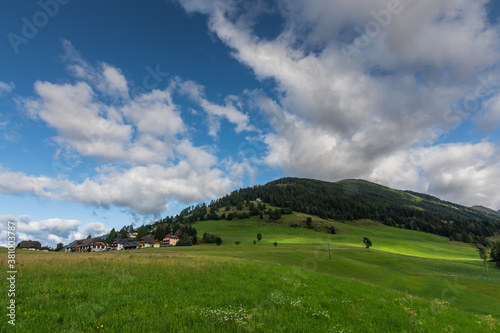 Wallpaper Mural green hills and clouds while hiking Torontodigital.ca