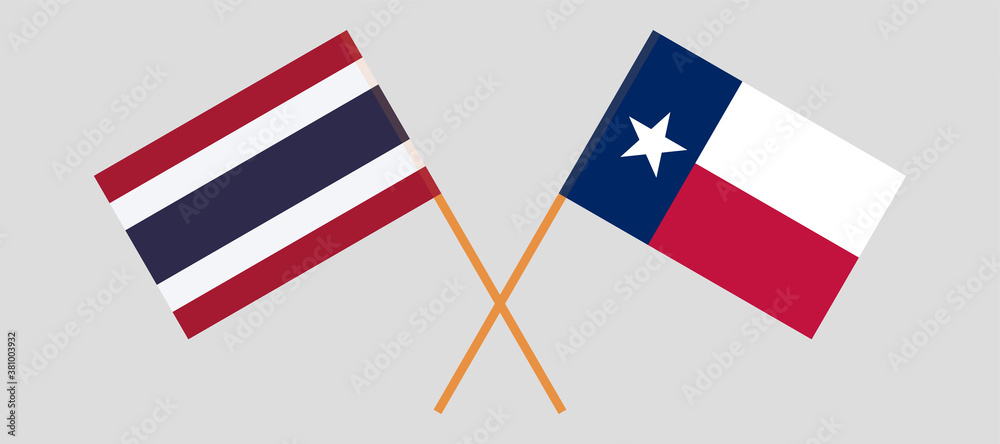 Crossed flags of the State of Texas and Thailand