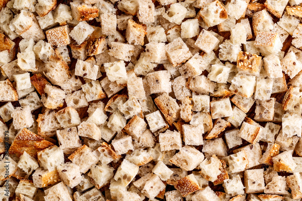 freshly baked rye bread with bran and cereal seeds: texture close-up. Healthy food.Dried bread crumbs freshly baked rye bread with bran and cereal seeds: texture close-up. Healthy food.Dried bread crumbs