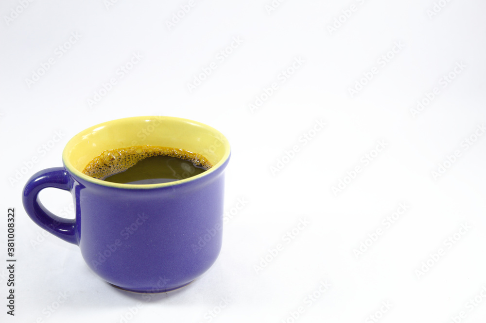 Blue and yellow coffee cup with white background Blue and yellow coffee cup with white background