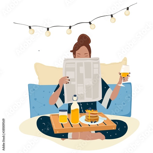 Young woman having a breakfast in bed and reading newspaper. Trendy vector cartoon flat illustration.