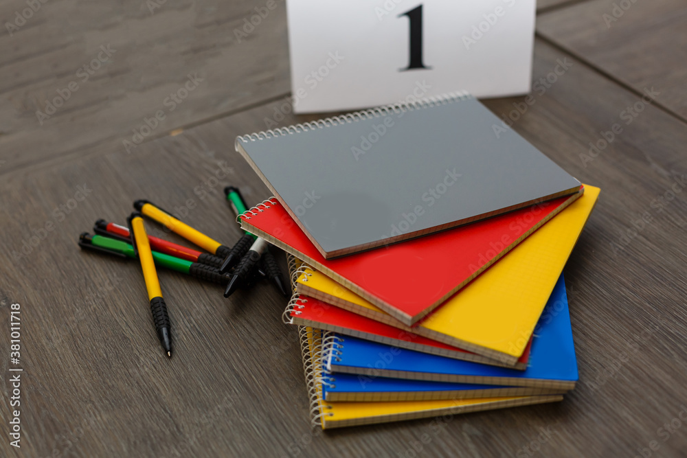 A book sitting on top of a wooden cutting board A book sitting on top of a wooden cutting board