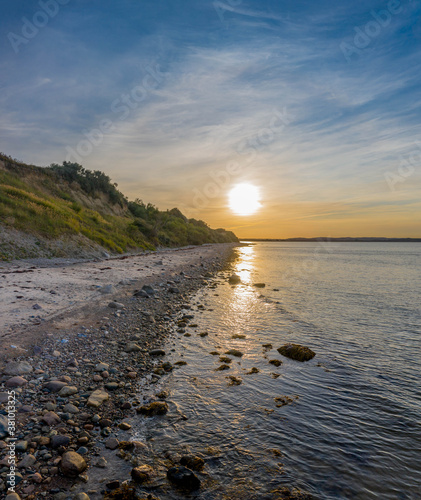Fototapeta Naklejka Na Ścianę i Meble -  Panorama view of sunset on the steep coast of the Baltic Sea.Panorama of wild romantic coastal cliff landscape at the Baltic Sea at the Wangels, by Hohwacht Bay, Ostholstein, Schleswig-Holstein.