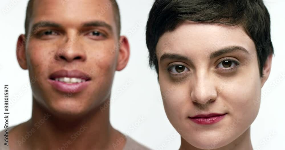 Portrait of a Latin American woman and African American man standing next to each other. Portrait of a Latin American woman and African American man standing next to each other.