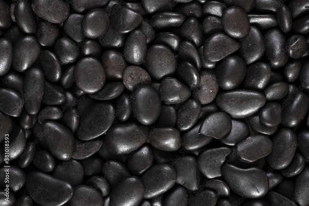 Black river stones texture and background. Black river stones texture and background.