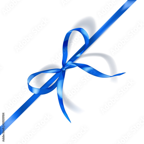 Light blue bow made of narrow ribbon with shadow on white background. Diagonal arrangement