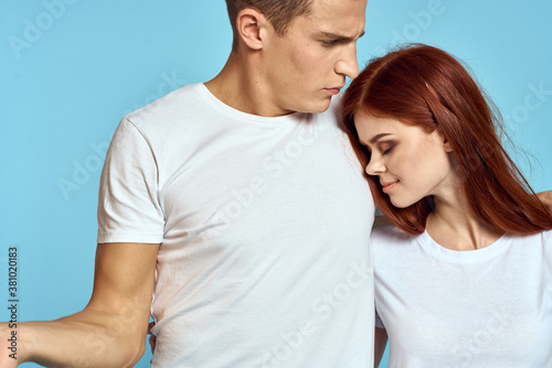 Portrait of man and woman on blue background Copy Space cropped view love family trust