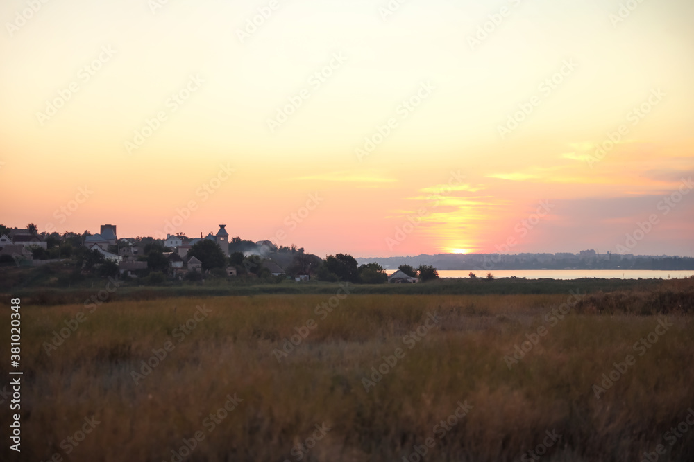 Beautiful view of field at sunrise. Early morning landscape