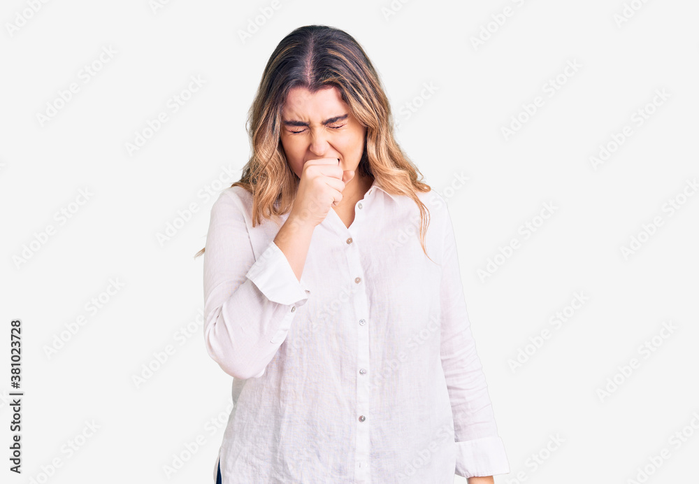 Young caucasian woman wearing casual clothes feeling unwell and coughing as symptom for cold or bronchitis. health care concept. Young caucasian woman wearing casual clothes feeling unwell and coughing as symptom for cold or bronchitis. health care concept.