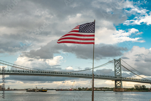 Benjamin franklin bridge as seen from penn's landing in philadelphia flag © Victor