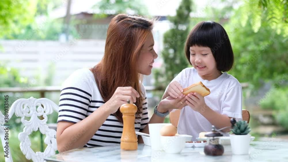 Mother have breakfast with her children, family time
Mother have breakfast with her children, family time