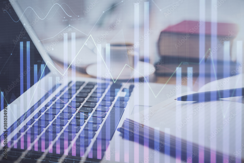 Double exposure of financial chart drawing and desktop with coffee and items on table background. Concept of forex market trading Double exposure of financial chart drawing and desktop with coffee and items on table background. Concept of forex market trading