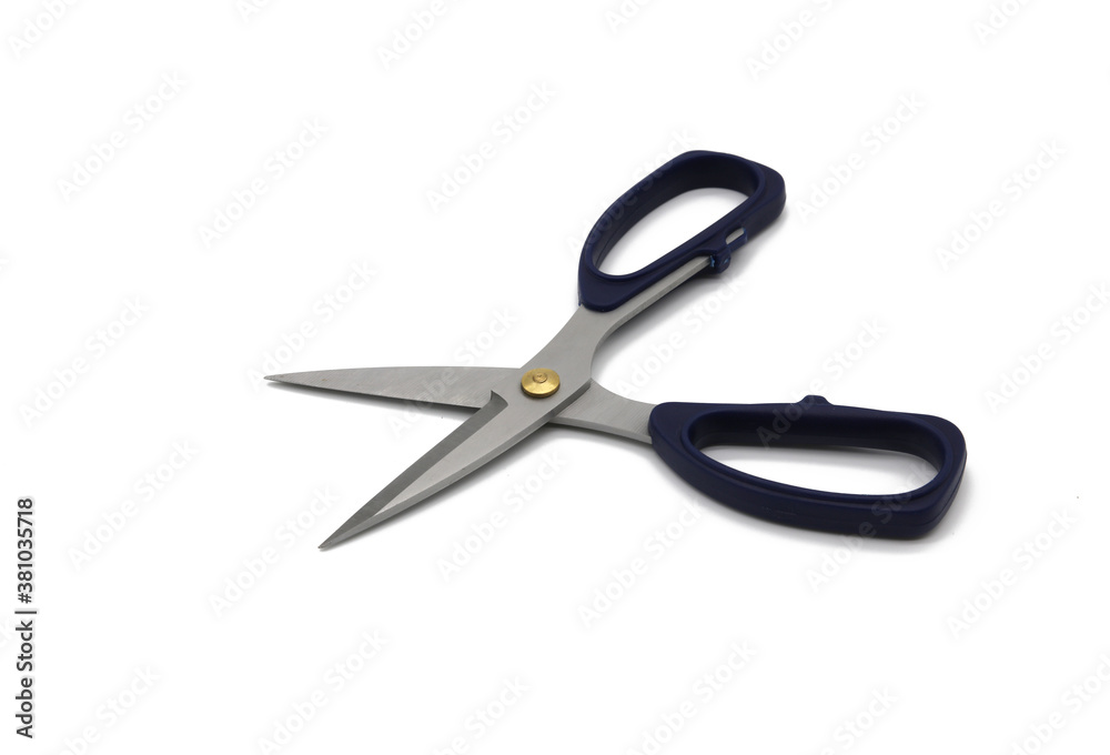 Scissors on white background board Scissors on white background board