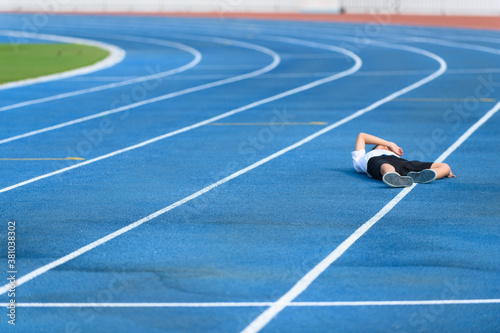 Young boy take rest after running