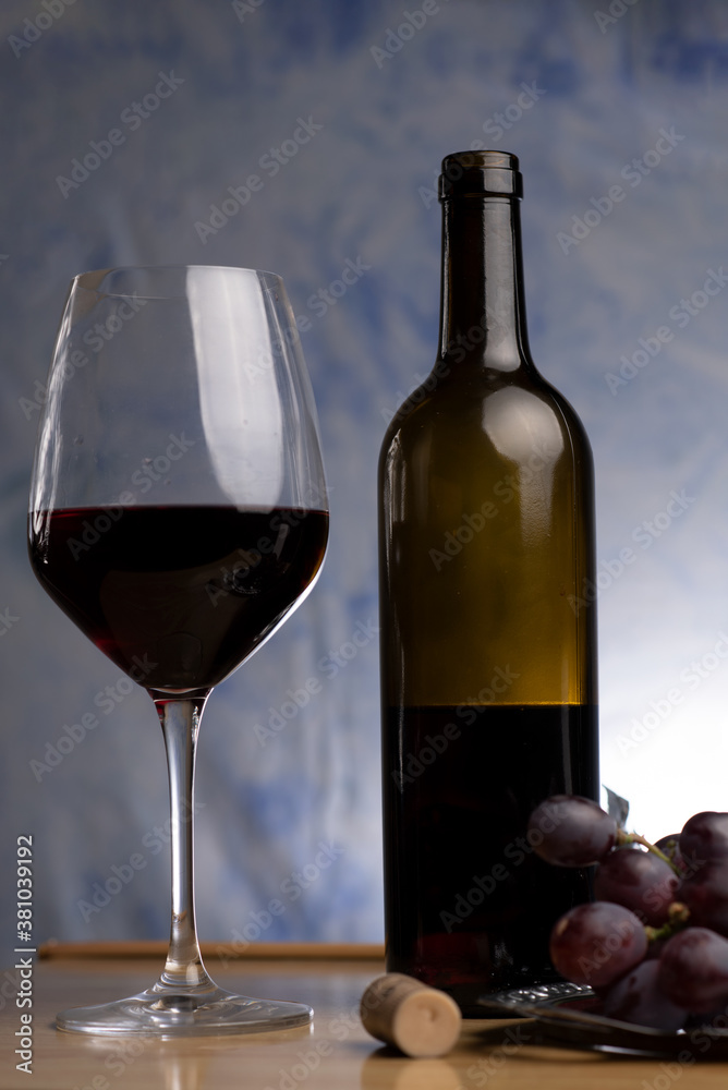 bottle of wine and grapes still life