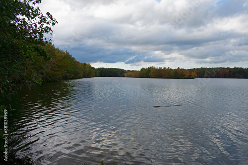 Views of early autum leaf color changes and cloud reflections in the lake at Plainsboro Preservation, South Brunswick, New jersey, USA -03