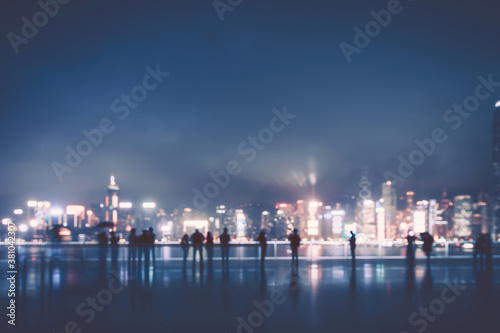 Abstract colorful circular bokeh with city background © joeycheung